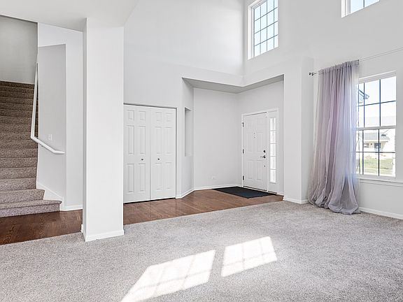 View towards entryway and stairwell.