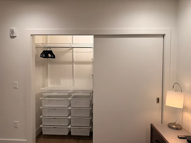 Huge closet with Elfa Container Store design. Keep things tidy in drawers, shelves or hanging.