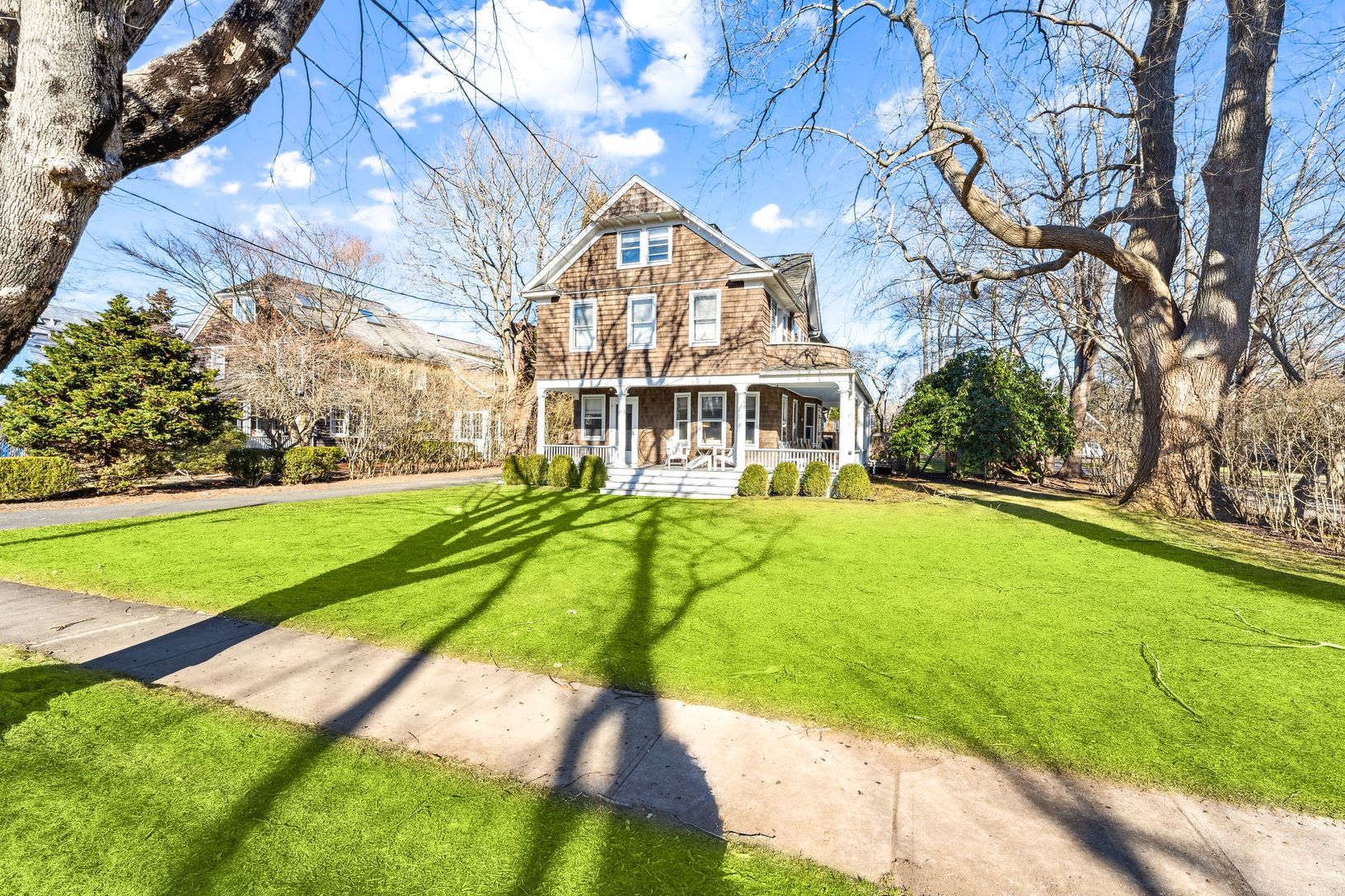 suinny front lawn and front porch