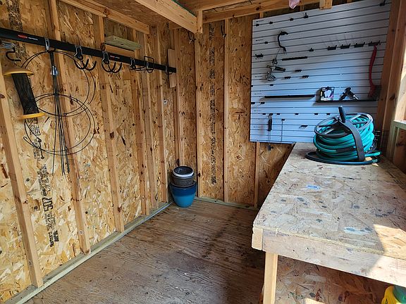 Huge garden shed in back yard to add to the double stall attached garage!
