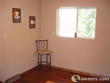 Eating area in kitchen, new wood floors, new window