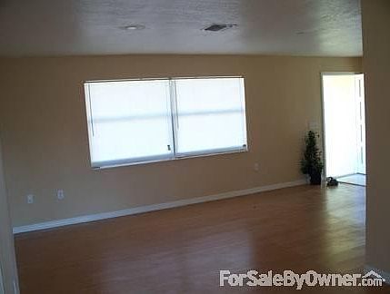 Back of House screened porch
						:
						Detailing tile, Bar, and both patio doors.