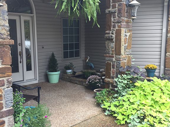 Front porch w/Koi Pond