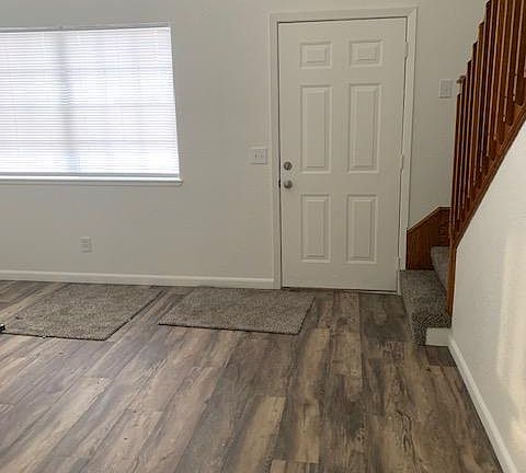 New flooring, all new interior painting, window coverings and new carpet