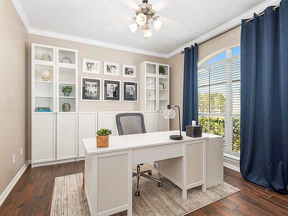 Private study with new wood tile.