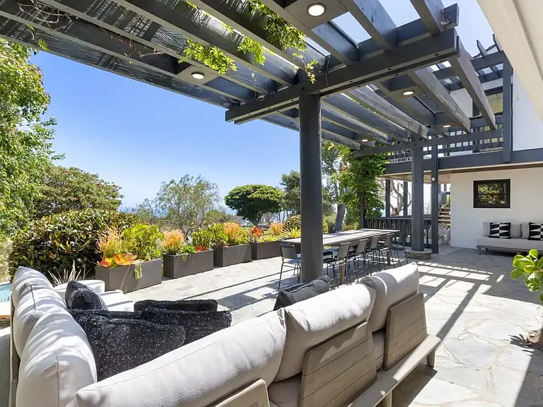 Luxurious outdoor seating overlooking the peaceful serenity.