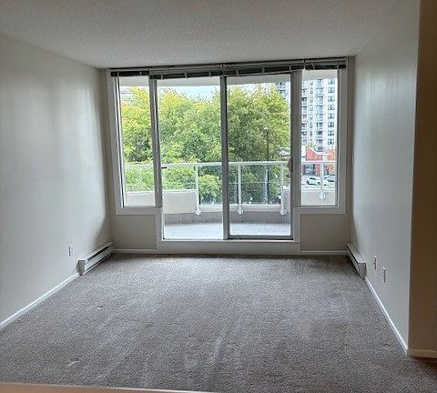 Living room with large south facing balcony
