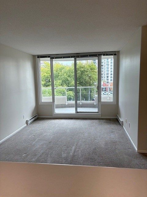 Living room with large south facing balcony