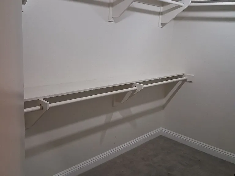 Walk in closet in master bedroom
