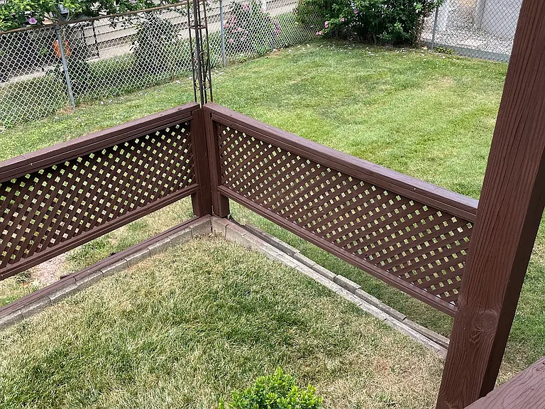 Backyard accessible area that is upkept weekly by a service.