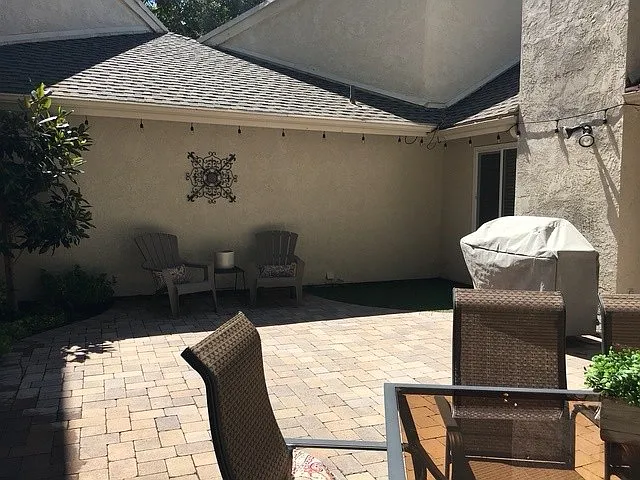 patio west pacing with small grass area