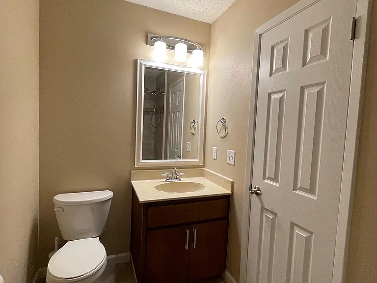 Main Bathroom. Putting in new solid surface counter top and faucet