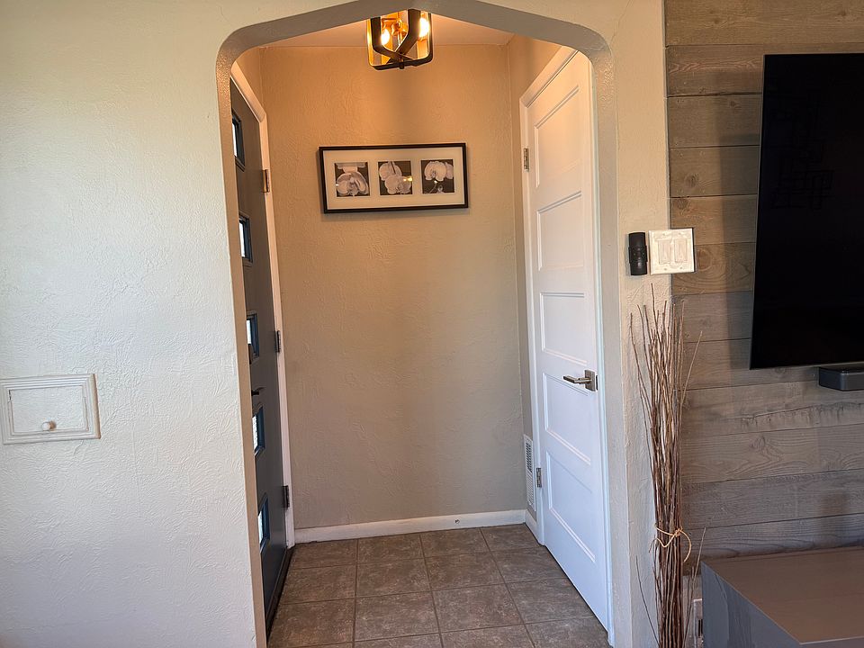 Front entrance from interior with coat closet