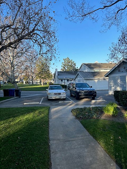 Guest parking. The unit has a two-car garage (not shown).