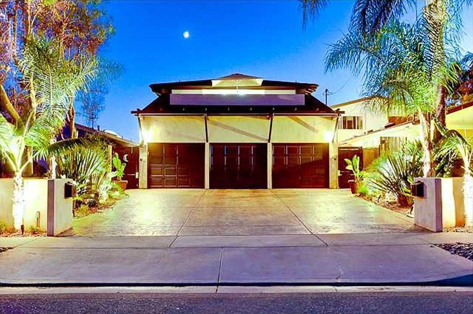 3 car garage and electronic gates make this a Private Beach Retreat