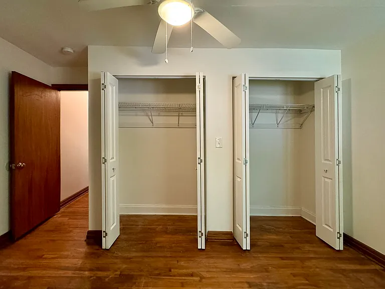 Bedroom 2 with continuous closet.