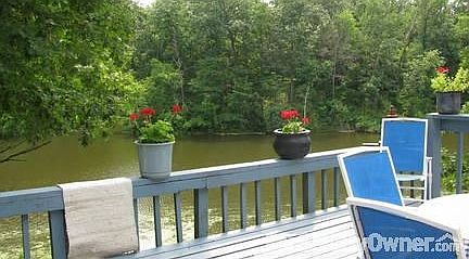 view from deck
						:
						Good sized deck over looks private lake. 8 acre lake is well stocked.