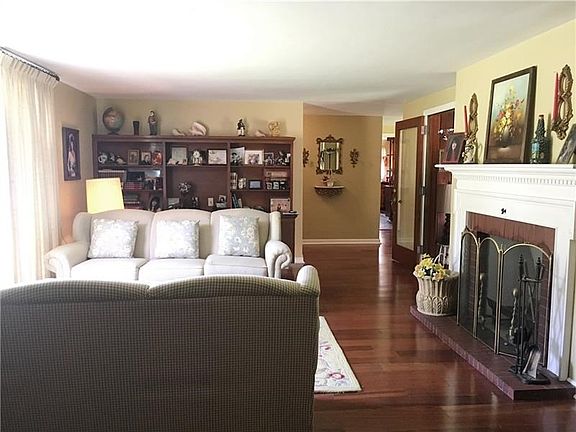 LIVING ROOM - Alternate view.  This is a very large room.  Large picture window to the left.  Open door on right leads to Family