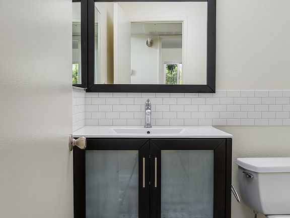 Upgraded bathroom
- New flooring
- Elevated vanity with plenty of storage
- Modern faucets
- Modern lighting