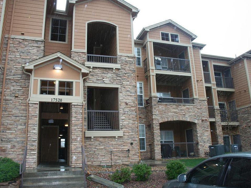 Building entrance and on street parking.