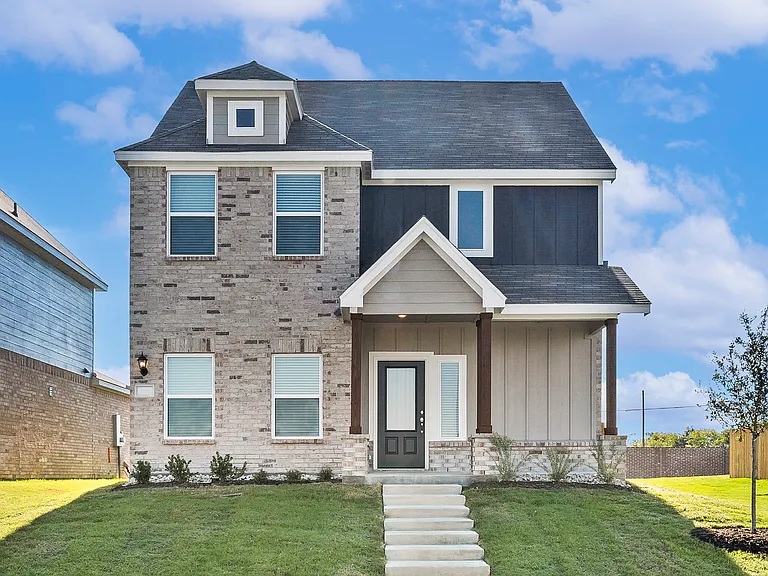 The Camellia has a brick and siding exterior.