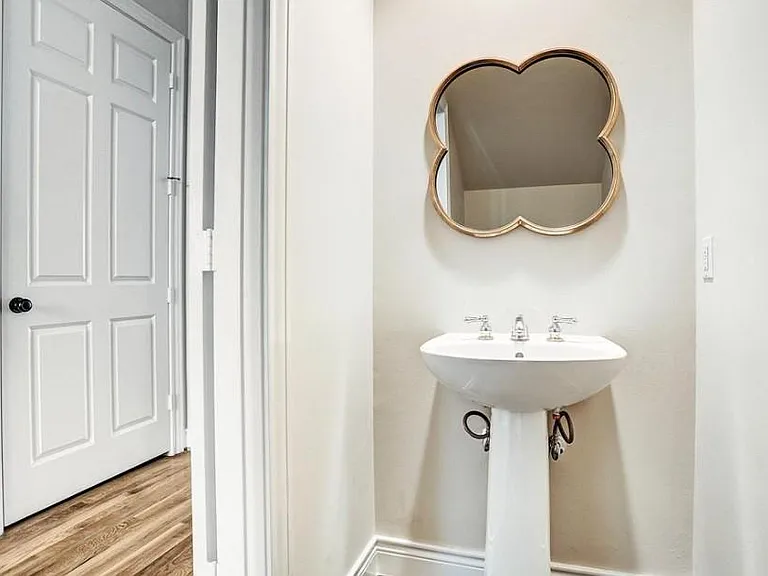 Convenient half bath located downstairs