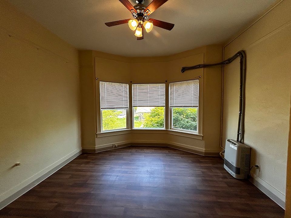Bay windows and high ceilings make this room light & bright!!