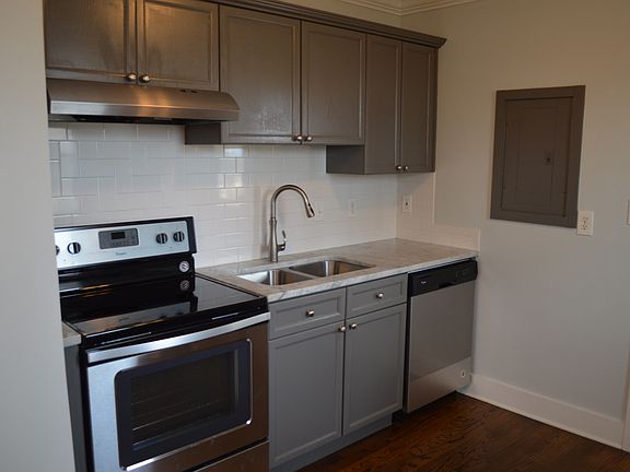 Kitchen w/ Granite Counters/Subway Tile Backsplash