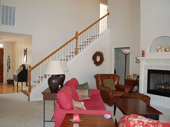 Staircase leads to 2 bedroom, bonus & full bath