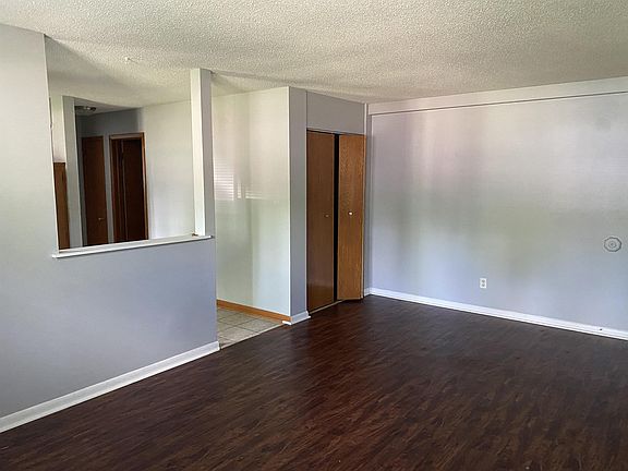 Large closet in living room. Open floor plan.