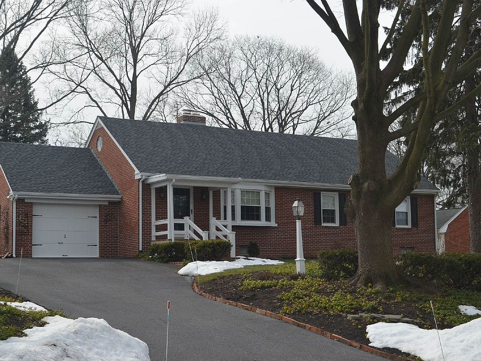 Meticulously maintained all Brick Cape Cod