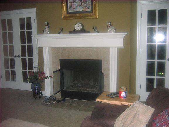 see-thru fireplace in dining and high family room