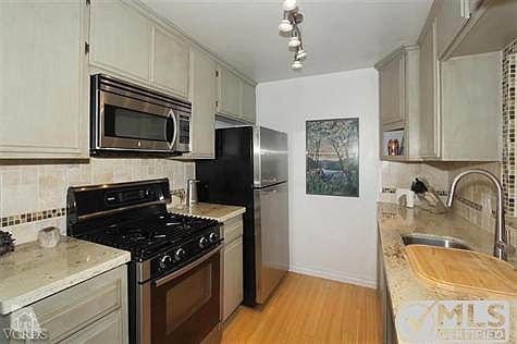 Kitchen also remodeled with Bamboo floors, newer appliances and lighting.