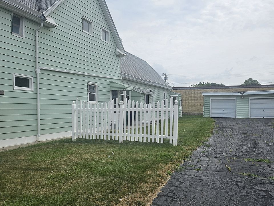 The long driveway and garage.