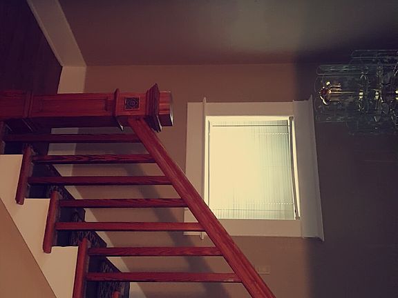 Stairway to 3 beds and bath