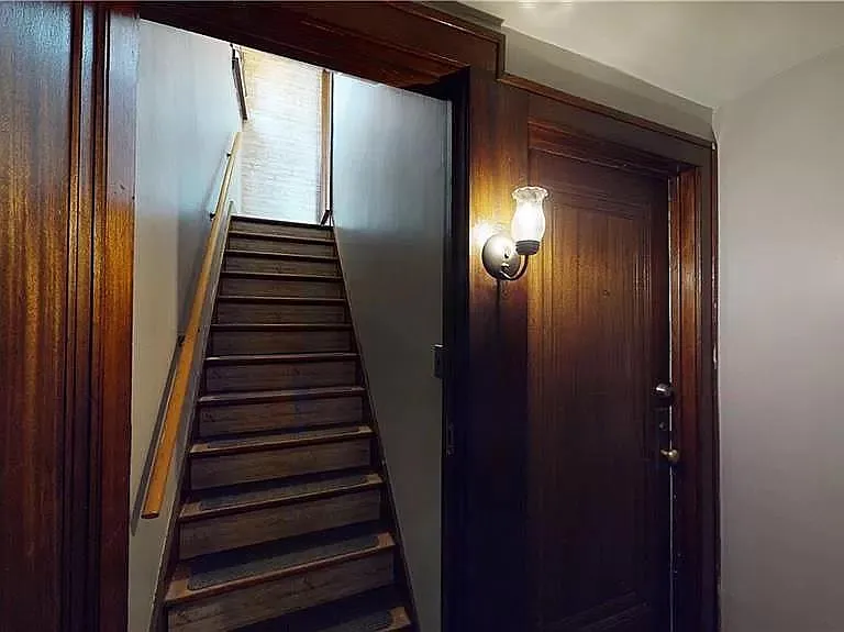 Hallway to upper unit