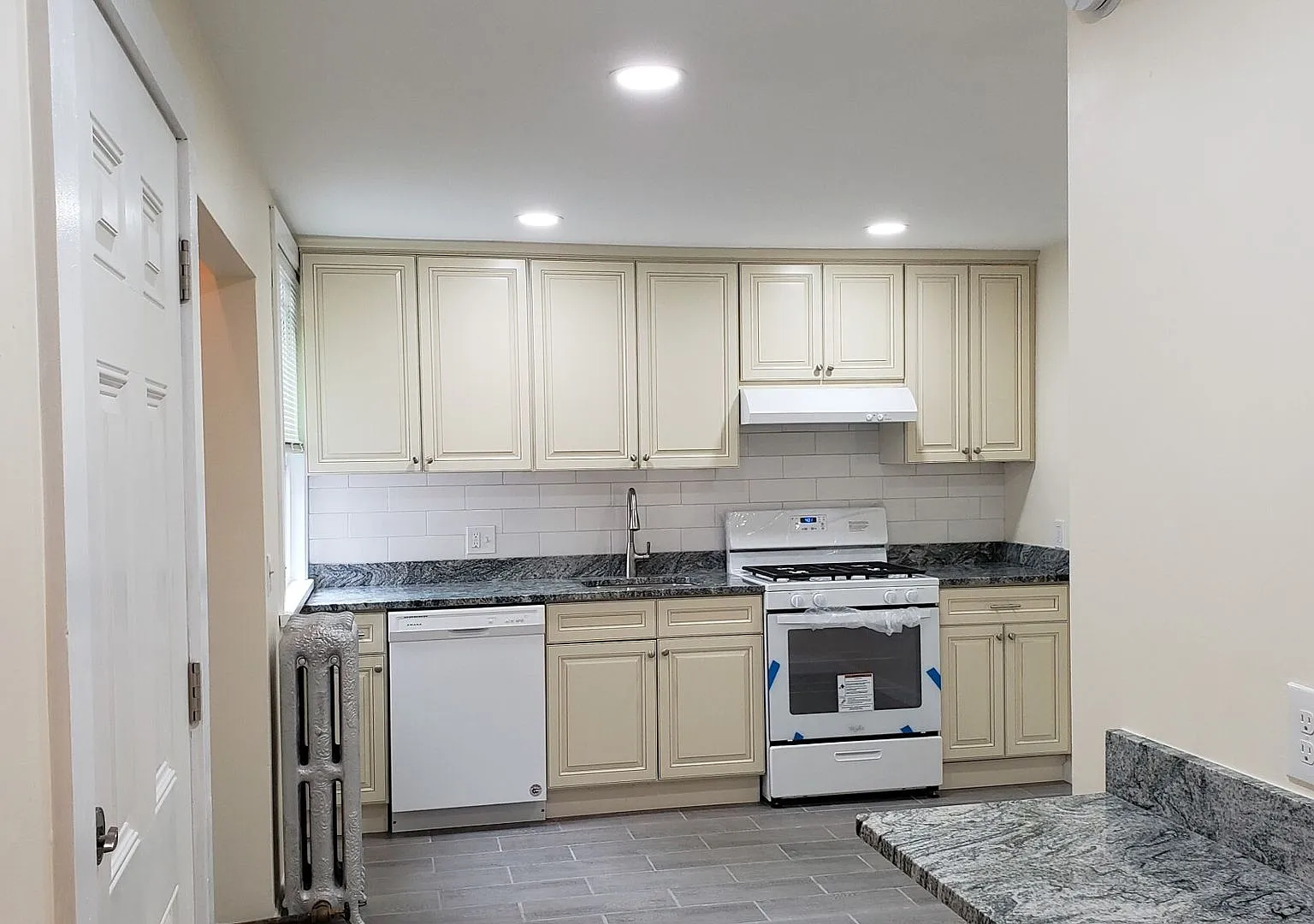 4 bed 2 bath w HT/HW Included and near the T! — Photo 1