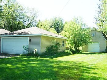 br There is a large 2.5 car garage plus a pole barn that is 2 stories..........only 12 years old.