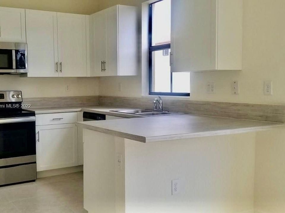 1st image of 11044 W 33rd Ct #11044