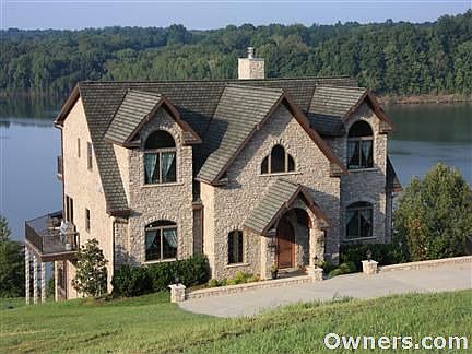 Front View Overlooking Property and Lake