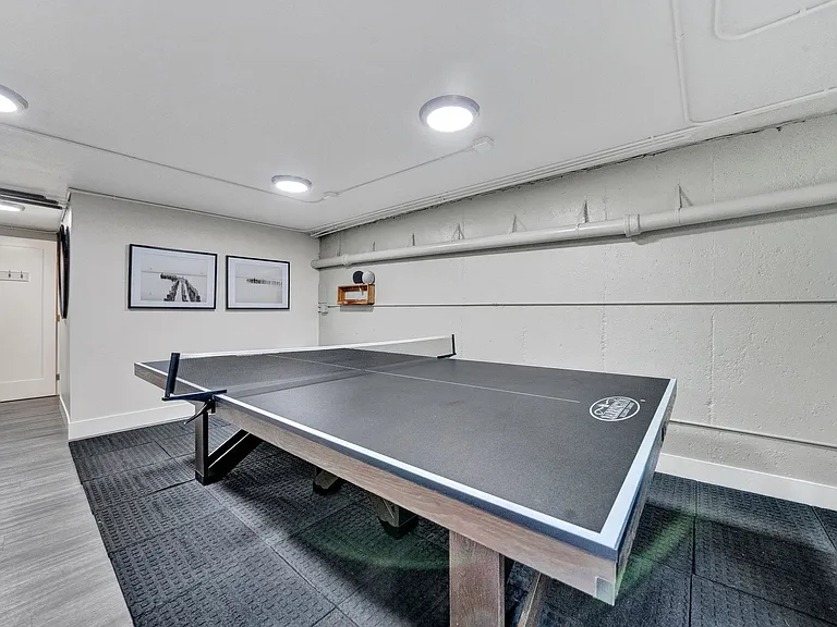 a recreation room with a ping pong table Sunset Station Apartments Portland Oregon