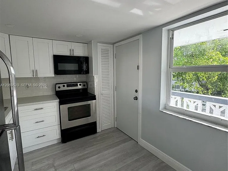 1398 NE 191st St #C305 — Photo 1