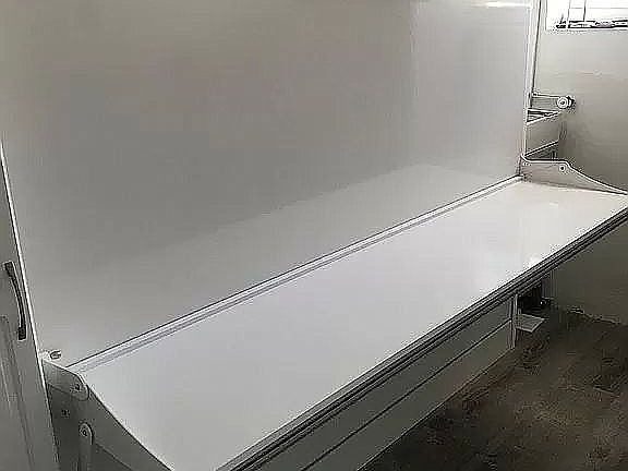 Murphy bed & desk in office