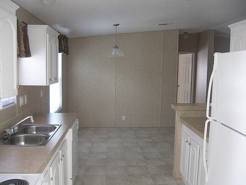 5th image of 3150 NE 36th Ave Lot 392