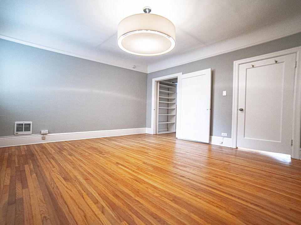bedroom with closet and heater
