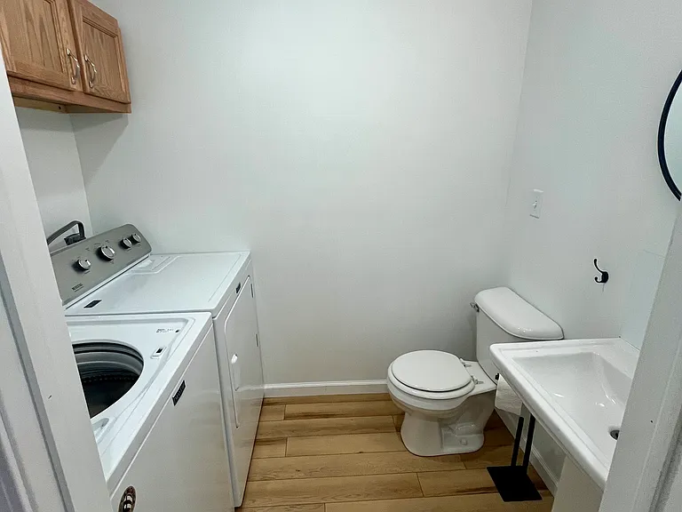 Downstairs half bath - washer and dryer included.