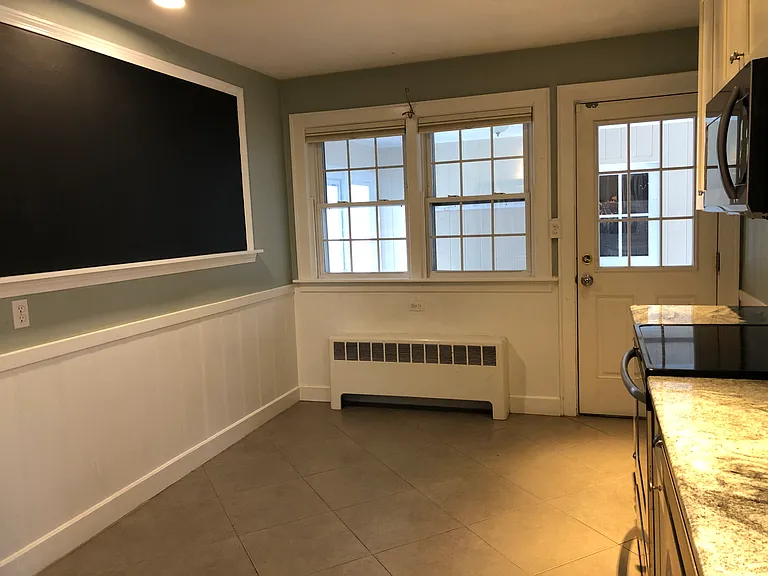 Kitchen looking out to the breezeway