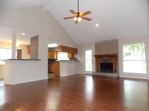 Lots of natural light. Gas fireplace. Open kitchen, living and dining.