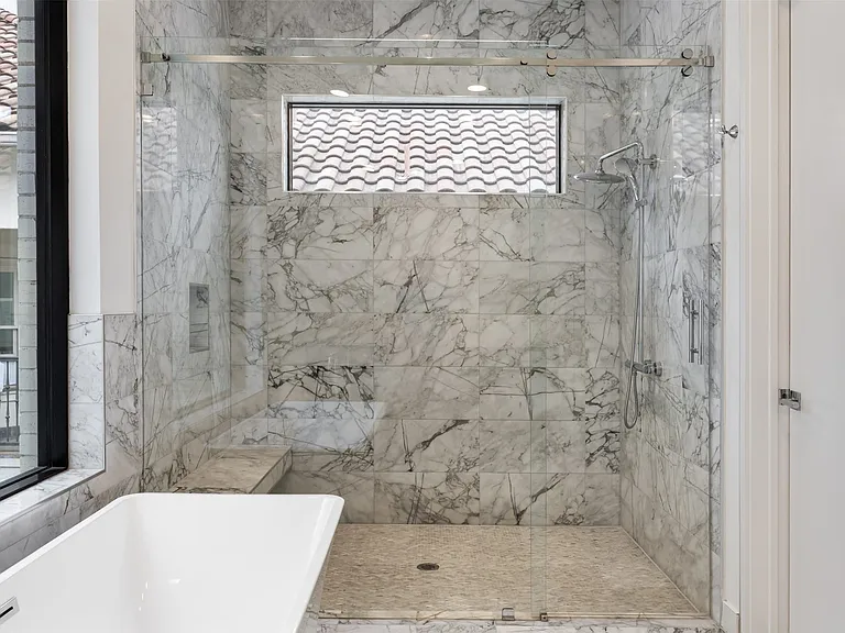 Separate shower with bench!