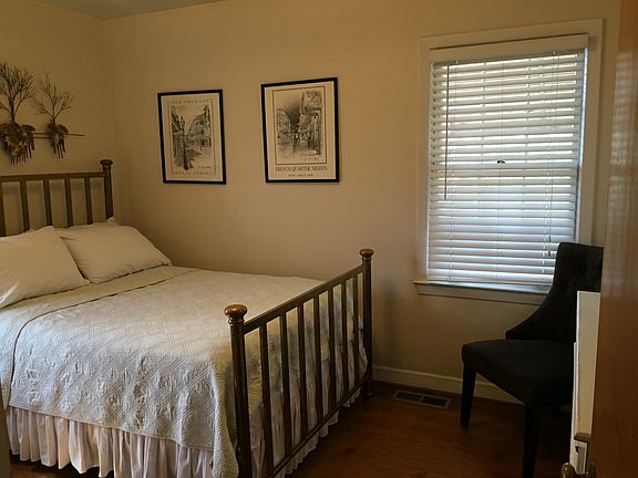 2nd bedroom, large closet, two windows, looks over backyard